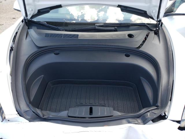 Photo 12 from auction – 2022 TESLA MODEL 3 with VIN 5YJ3E1EAXNF309182