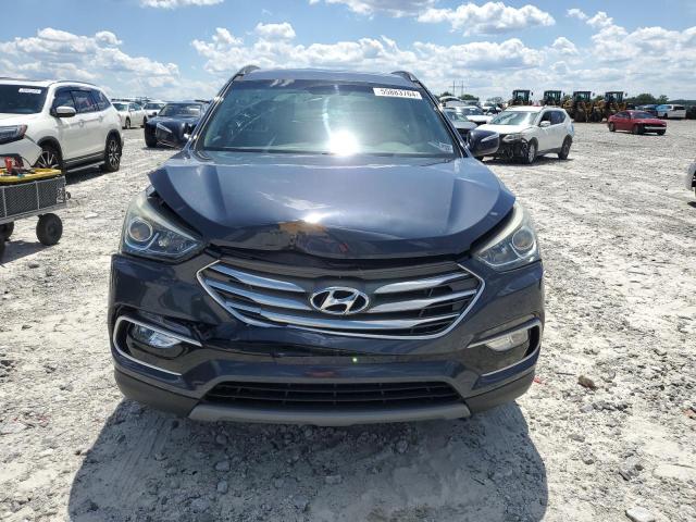 Photo 5 from auction – 2017 HYUNDAI SANTA FE S with VIN 5NMZU3LB0HH020206