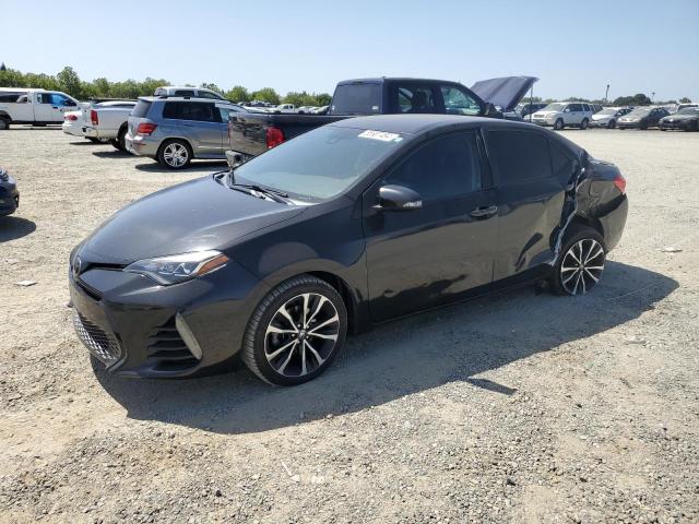 TOYOTA COROLLA L 2017 with VIN 5YFBURHE7HP643299 - Photo from auction