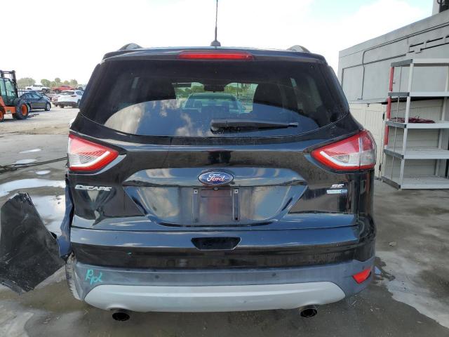 Photo 6 from auction – 2016 FORD ESCAPE SE with VIN 1FMCU9GXXGUB42508