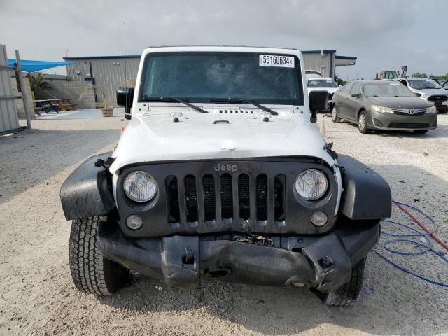 Photo 5 from auction – 2016 JEEP WRANGLER U with VIN 1C4BJWDG5GL166359