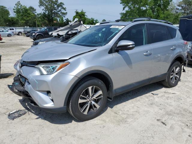 TOYOTA RAV4 XLE 2017 with VIN 2T3RFREV5HW613544 - Photo from auction