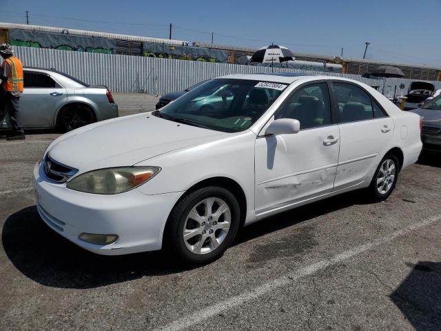 TOYOTA CAMRY LE 2004 with VIN JTDBE32K240252977 - Photo from auction