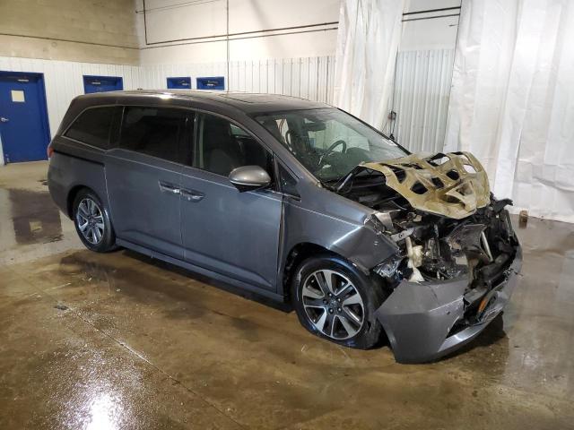 Photo 4 from auction – 2014 HONDA ODYSSEY TO with VIN 5FNRL5H93EB085116