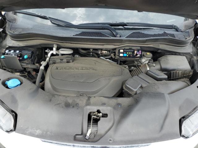 Photo 12 from auction – 2021 HONDA PILOT LX with VIN 5FNYF5H19MB007208