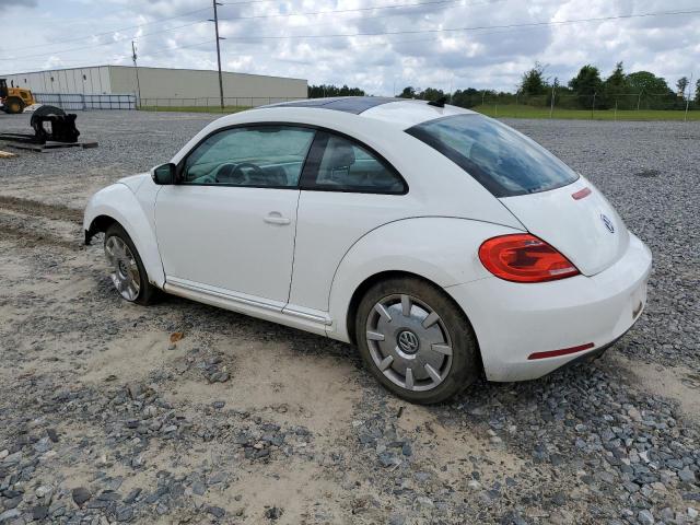 Photo 2 from auction – 2013 VOLKSWAGEN BEETLE with VIN 3VWJX7AT2DM683997