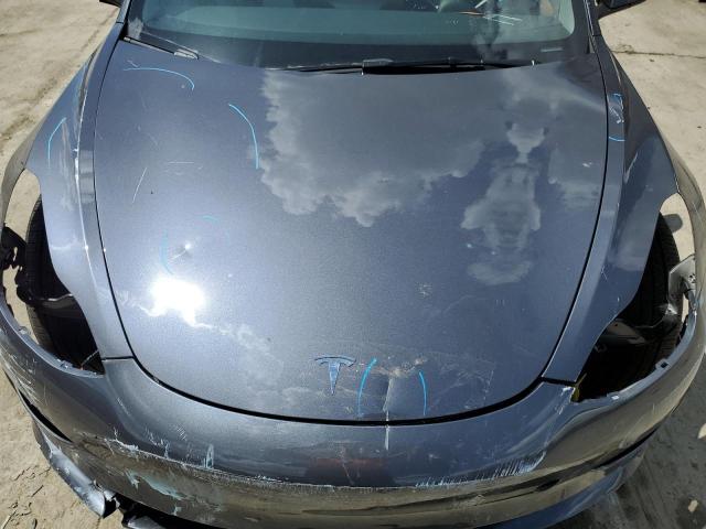 Photo 11 from auction – 2023 TESLA MODEL 3 with VIN 5YJ3E1EA5PF702669