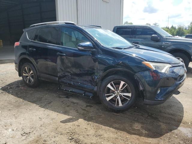 Photo 4 from auction – 2017 TOYOTA RAV4 XLE with VIN 2T3WFREV9HW334455