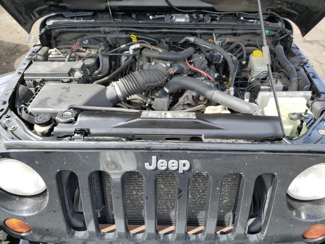 Photo 11 from auction – 2011 JEEP WRANGLER U with VIN 1J4HA5H10BL633605