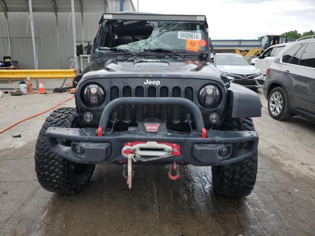 Photo 5 from auction – 2016 JEEP WRANGLER U with VIN 1C4BJWFG3GL145670