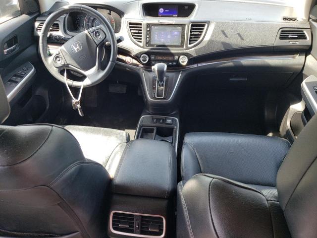 Photo 8 from auction – 2015 HONDA CR-V EXL with VIN 2HKRM4H72FH704555