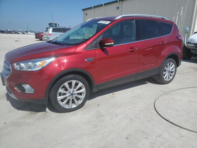 FORD ESCAPE TIT 2017 with VIN 1FMCU0J90HUD40196 - Photo from auction