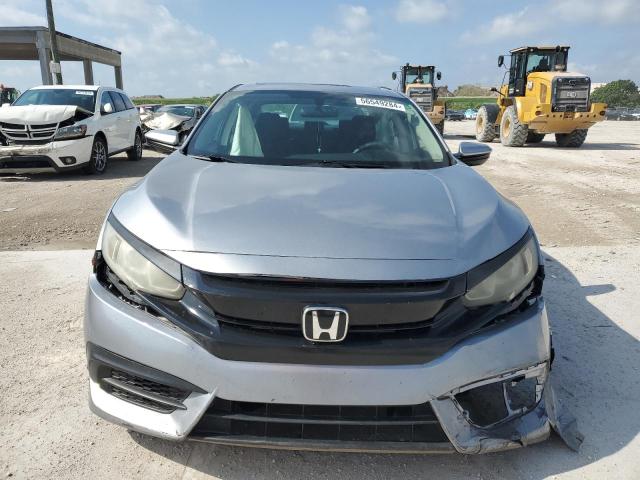 Photo 5 from auction – 2018 HONDA CIVIC EX with VIN 19XFC2F71JE003435