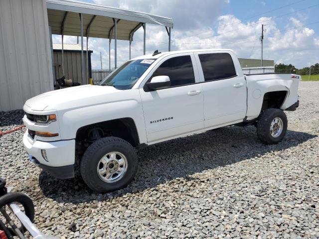 CHEVROLET SILVERADO 2018 with VIN 3GCUKREC3JG119306 - Photo from auction