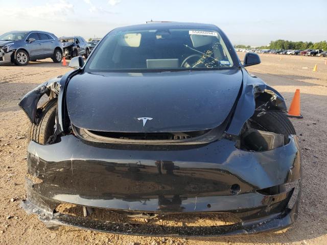 Photo 5 from auction – 2022 TESLA MODEL 3 with VIN 5YJ3E1EA2NF118355