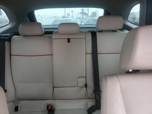 Photo 10 from auction – 2014 BMW X1 SDRIVE2 with VIN WBAVM1C50EVW50428