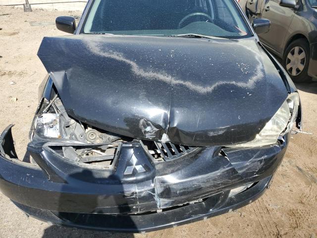 Photo 11 from auction – 2004 MITSUBISHI LANCER RAL with VIN JA3AD69F74U036719