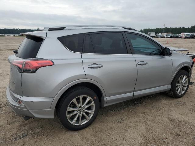 Photo 3 from auction – 2018 TOYOTA RAV4 LIMIT with VIN 2T3YFREV0JW415617