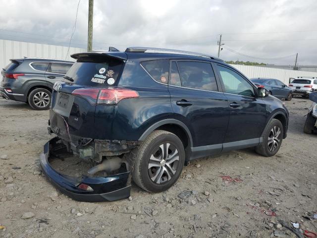 Photo 3 from auction – 2018 TOYOTA RAV4 LE with VIN 2T3ZFREVXJW497571