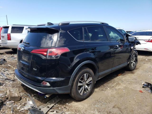 Photo 3 from auction – 2016 TOYOTA RAV4 XLE with VIN 2T3WFREV5GW241964