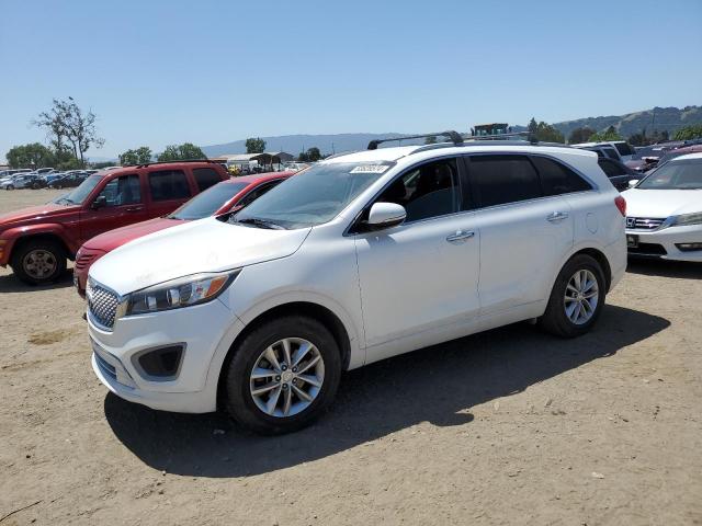 KIA SORENTO LX 2016 with VIN 5XYPG4A52GG156752 - Photo from auction