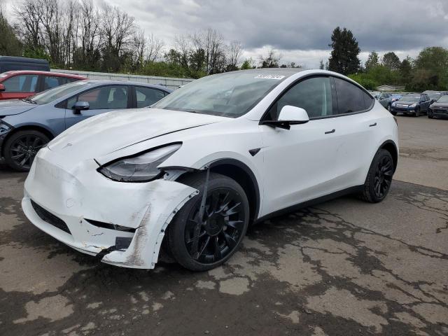 TESLA MODEL Y 2024 with VIN 7SAYGAEE6RF985642 - Photo from auction