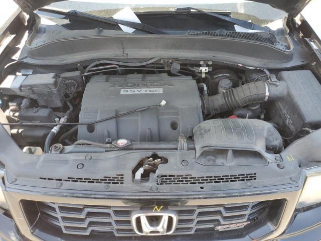 Photo 11 from auction – 2014 HONDA RIDGELINE with VIN 5FPYK1F71EB007661