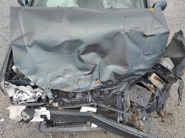 Photo 11 from auction – 2003 TOYOTA CAMRY LE with VIN JTDBE32K530173950