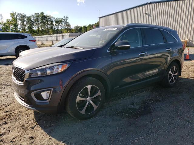 KIA SORENTO EX 2016 with VIN 5XYPHDA19GG137304 - Photo from auction