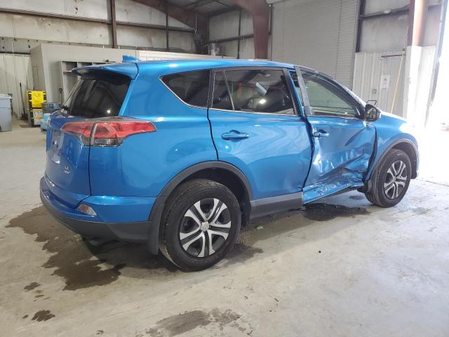 Photo 3 from auction – 2018 TOYOTA RAV4 LE with VIN JTMBFREV2JJ720489