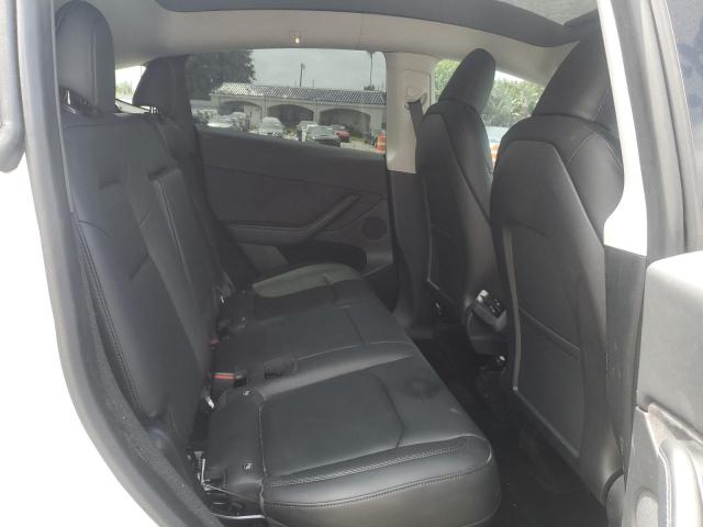 Photo 10 from auction – 2023 TESLA MODEL Y with VIN 7SAYGDEE6PA083665