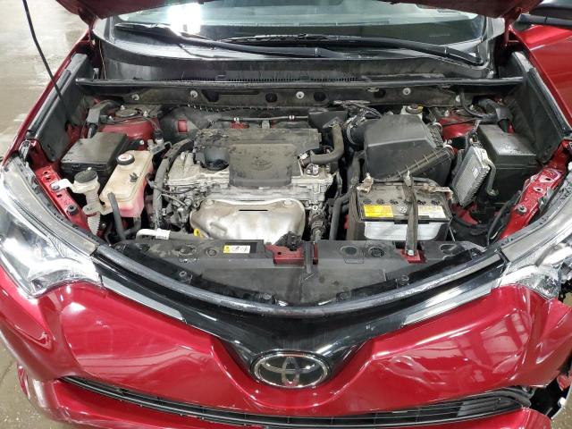 Photo 11 from auction – 2018 TOYOTA RAV4 LE with VIN JTMBFREV7JD237658