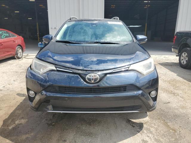Photo 5 from auction – 2017 TOYOTA RAV4 XLE with VIN 2T3WFREV9HW334455