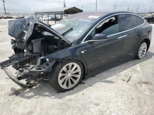 TESLA MODEL X 2018 with VIN 5YJXCDE24JF125917 - Photo from auction
