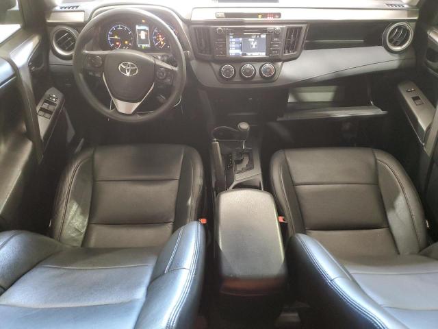 Photo 8 from auction – 2018 TOYOTA RAV4 LE with VIN JTMBFREV2JJ720489