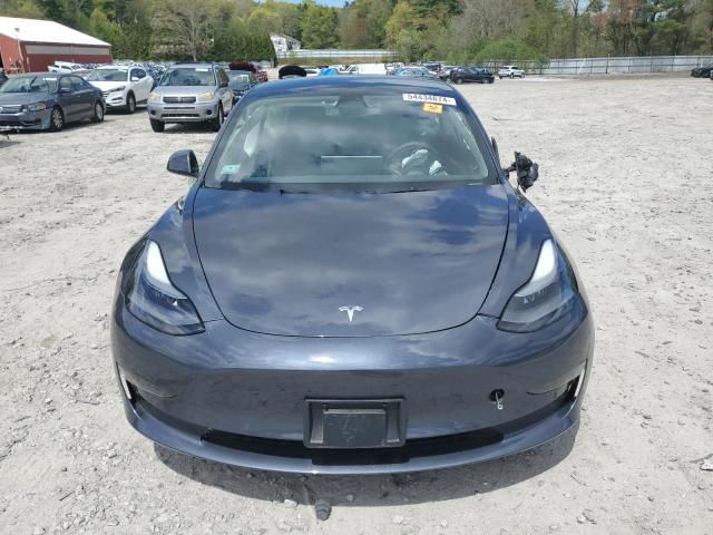 Photo 5 from auction – 2022 TESLA MODEL 3 with VIN 5YJ3E1EBXNF277231