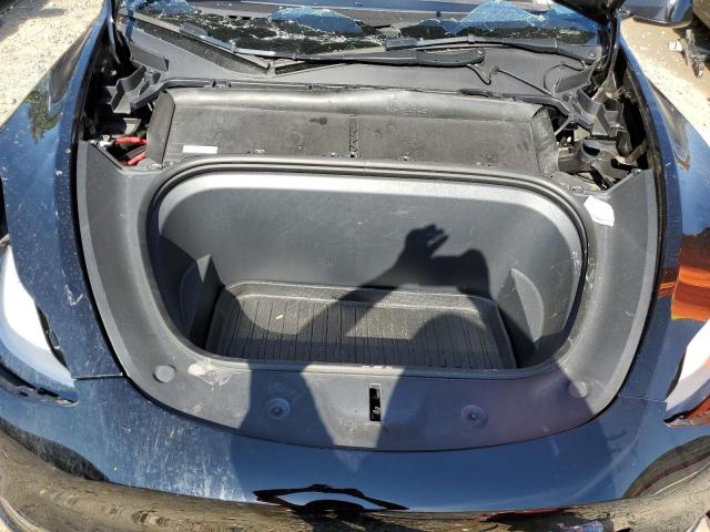 Photo 11 from auction – 2023 TESLA MODEL Y with VIN 7SAYGDEE0PF883459