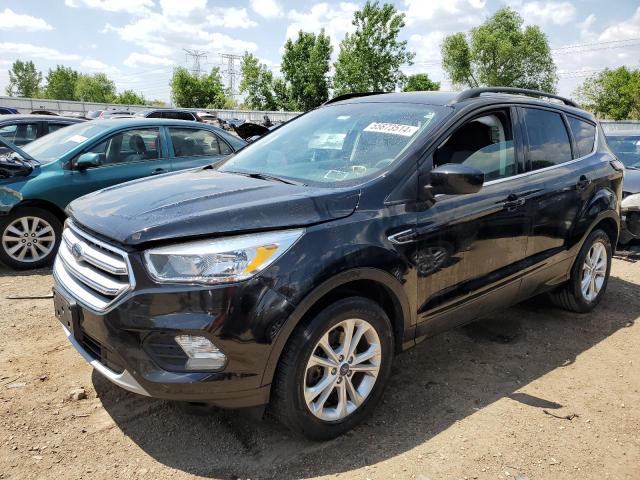 FORD ESCAPE SE 2018 with VIN 1FMCU9GD5JUB73632 - Photo from auction