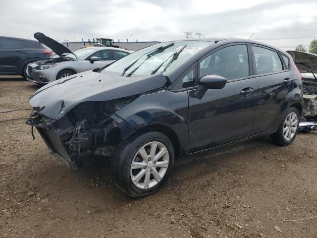 FORD FIESTA SE 2011 with VIN 3FADP4EJ4BM134599 - Photo from auction