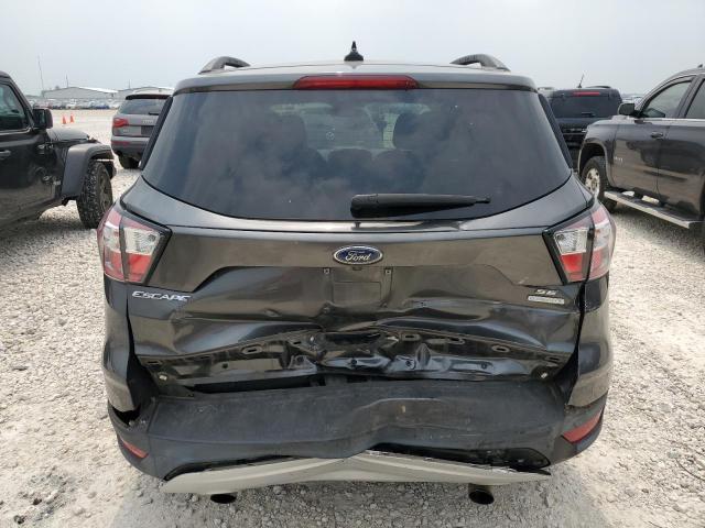 Photo 6 from auction – 2018 FORD ESCAPE SE with VIN 1FMCU0GD0JUB47936