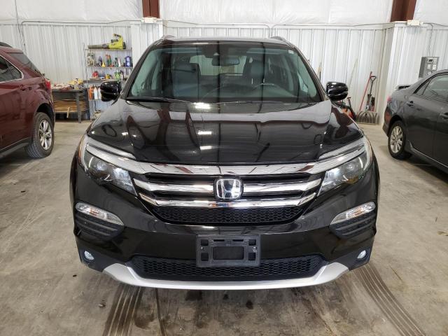 Photo 5 from auction – 2017 HONDA PILOT TOUR with VIN 5FNYF6H95HB008759