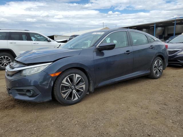 HONDA CIVIC EX 2016 with VIN 19XFC1F39GE212938 - Photo from auction