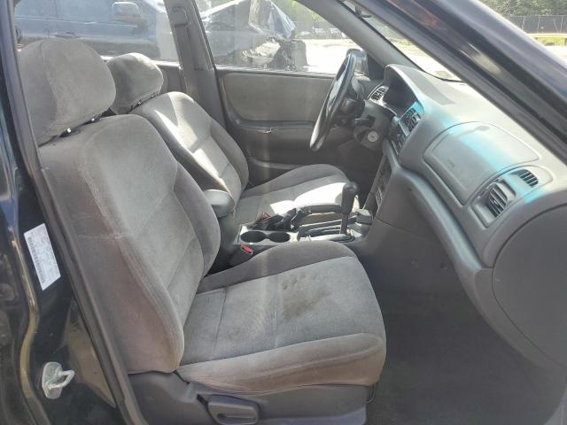 Photo 7 from auction – 1999 MAZDA 626 ES with VIN 1YVGF22C8X5883899