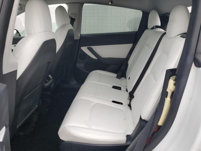 Photo 11 from auction – 2022 TESLA MODEL Y with VIN 7SAYGAEE0NF360454