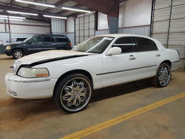LINCOLN TOWN CAR E 2003 with VIN 1LNHM81W03Y670237 - Photo from auction