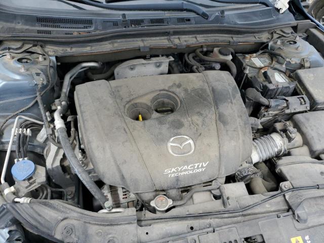 Photo 11 from auction – 2014 MAZDA 3 TOURING with VIN JM1BM1V71E1142948