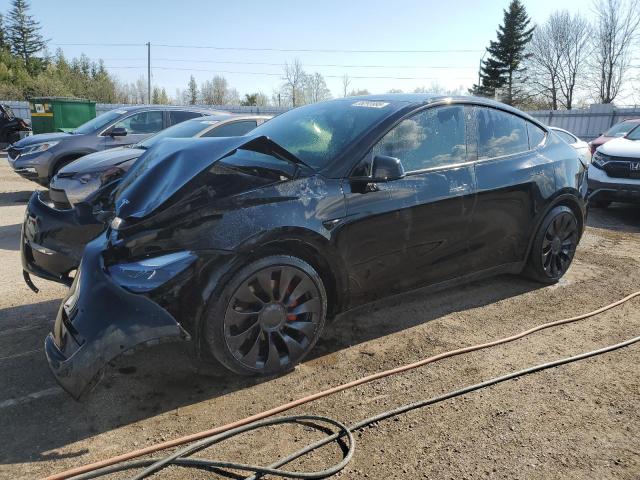 TESLA MODEL Y 2022 with VIN 7SAYGDEF5NF515610 - Photo from auction