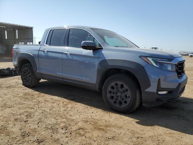 Photo 4 from auction – 2022 HONDA RIDGELINE with VIN 5FPYK3F73NB029320