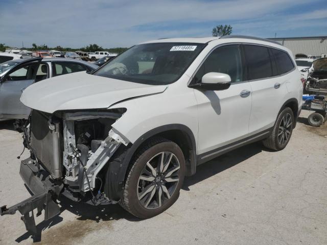 HONDA PILOT TOUR 2020 with VIN 5FNYF6H98LB013222 - Photo from auction