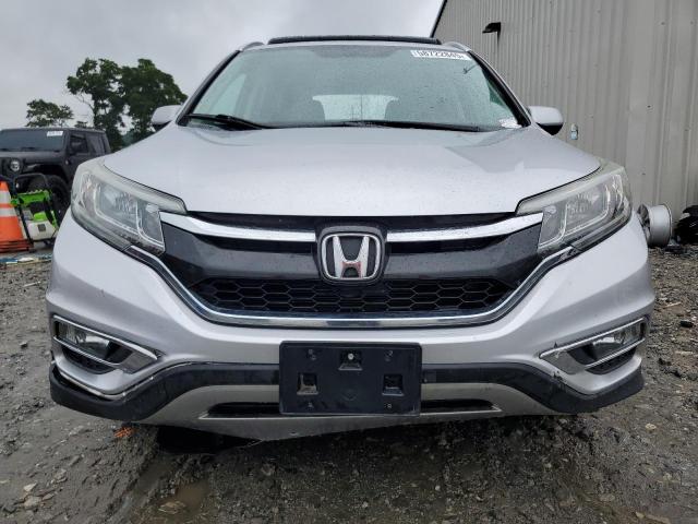 Photo 5 from auction – 2015 HONDA CR-V with VIN 2HKRM3H76FH531035